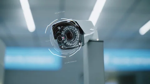 AI-enabled security camera with HUD overlay